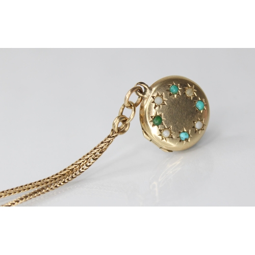 86 - A 9ct gold turquoise and simulated pearl set locket pendant, of circular form, the cover set with al... 