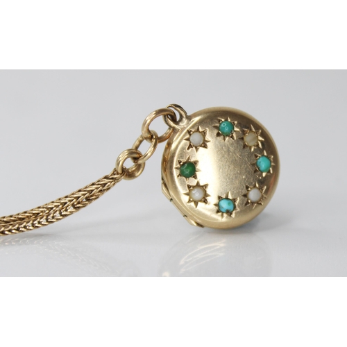 86 - A 9ct gold turquoise and simulated pearl set locket pendant, of circular form, the cover set with al... 