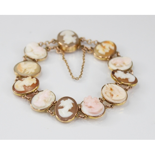 91 - a carved shell cameo gold coloured bracelet, comprising eleven oval carved shell cameos depicting fe... 