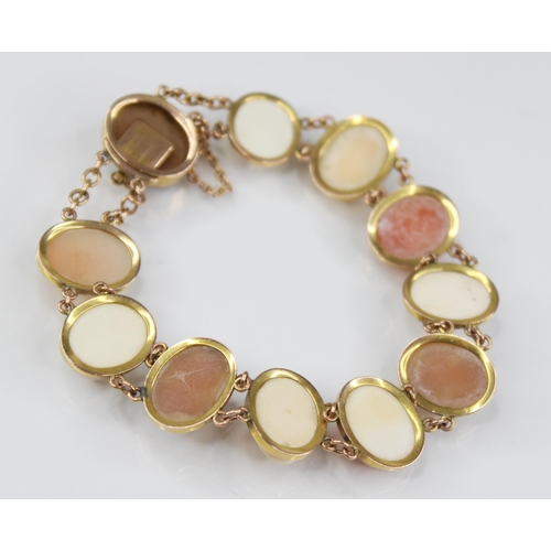 91 - a carved shell cameo gold coloured bracelet, comprising eleven oval carved shell cameos depicting fe... 