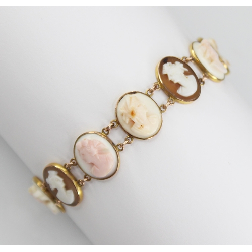 91 - a carved shell cameo gold coloured bracelet, comprising eleven oval carved shell cameos depicting fe... 