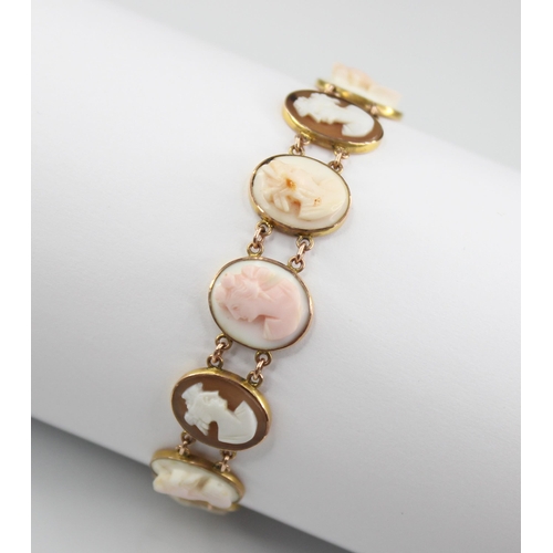 91 - a carved shell cameo gold coloured bracelet, comprising eleven oval carved shell cameos depicting fe... 