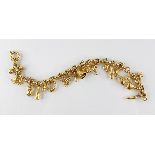 94 - A gold coloured charm bracelet, the belcher link chain with spring ring and loop fastening, suspendi... 