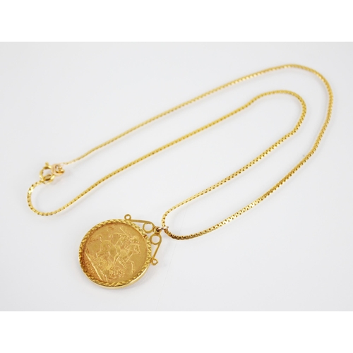 40 - A Victorian sovereign, dated 1899, set to a 9ct gold pendant mount, upon a 9ct gold woven chain with... 