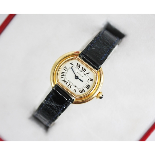 56 - A lady's Cartier Ellipse 18ct gold wristwatch, white dial with Roman numerals and inner seconds trac... 