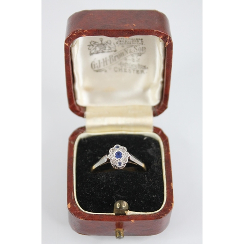 70 - An early 20th century sapphire and diamond 18ct gold and platinum ring, designed as a central oval m... 