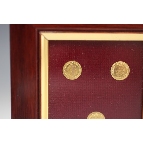 45 - A framed set of five gold coloured coins, each approximately 10mm diameter, each depicting a histori... 