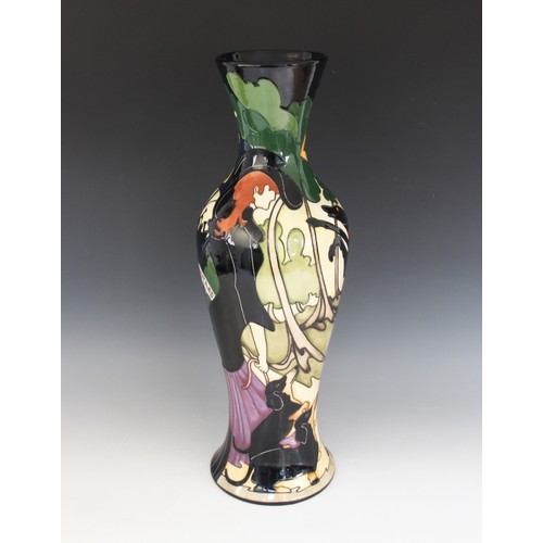 381 - A Limited Edition Moorcroft vase of large proportions, decorated in 'The Dog Walkers' pattern by Ker... 