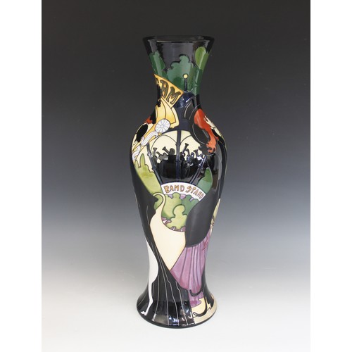 381 - A Limited Edition Moorcroft vase of large proportions, decorated in 'The Dog Walkers' pattern by Ker... 