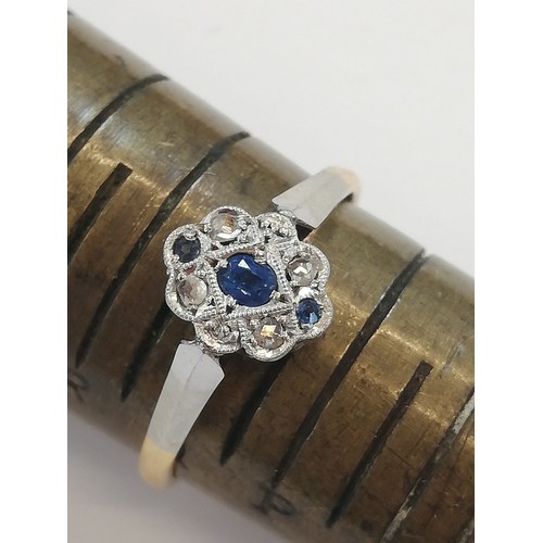 70 - An early 20th century sapphire and diamond 18ct gold and platinum ring, designed as a central oval m... 