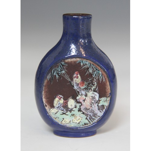 305 - A Chinese blue-ground Yixing stoneware snuff bottle, 19th century, decorated with two reserves depic... 