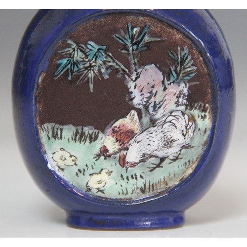 305 - A Chinese blue-ground Yixing stoneware snuff bottle, 19th century, decorated with two reserves depic... 