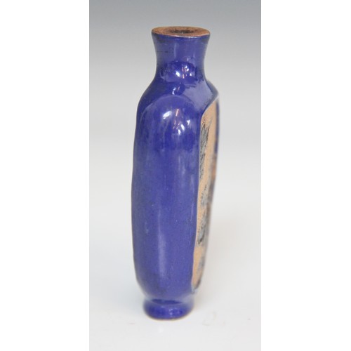 306 - A Chinese blue-ground Yixing stoneware snuff bottle, 19th century, decorated with two reserves depic... 