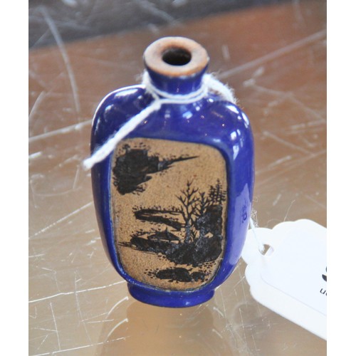 306 - A Chinese blue-ground Yixing stoneware snuff bottle, 19th century, decorated with two reserves depic... 