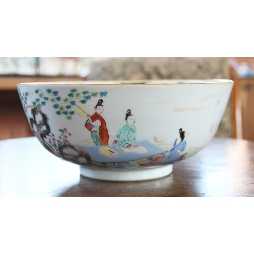 294 - A Chinese porcelain bowl, 18th century, decorated in a famille vert palette depicting figures seated... 