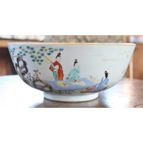 294 - A Chinese porcelain bowl, 18th century, decorated in a famille vert palette depicting figures seated... 