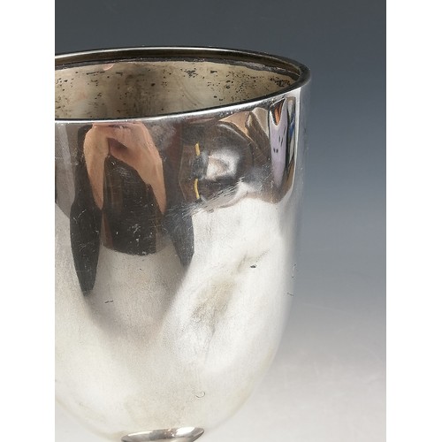 12 - A George V silver trophy cup, William Neale & Son Ltd, Birmingham 1931, of plain polished tapered fo... 