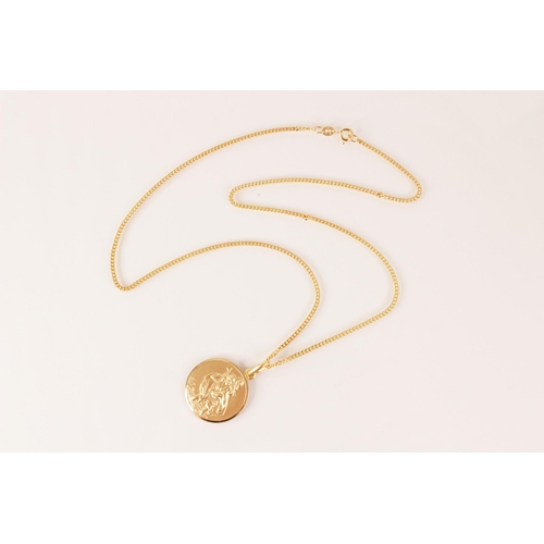 107 - A 9ct gold St. Christopher pendant, of circular form, 22mm diameter, upon a 9ct gold curb link chain... 