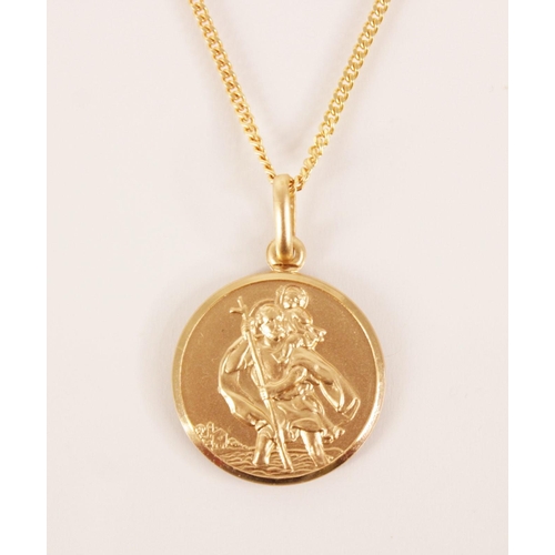 107 - A 9ct gold St. Christopher pendant, of circular form, 22mm diameter, upon a 9ct gold curb link chain... 