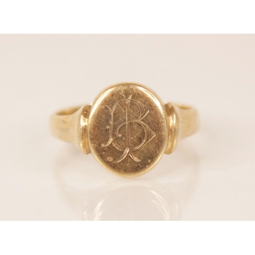 114 - A 9ct gold signet ring, the central oval head measuring 13mm x 11mm, engraved with monogrammed initi... 