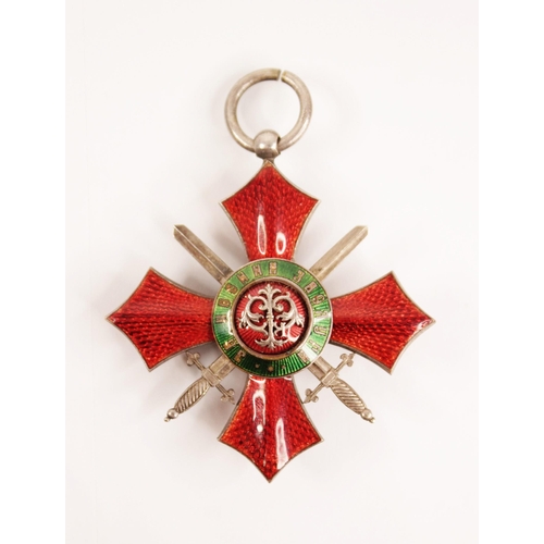 125 - A Bulgarian Order of National Merit Military Division medallion, decorated in red and green enamel, ... 