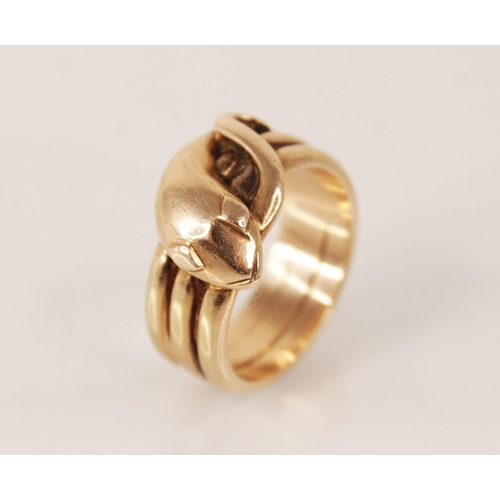 138 - A 9ct gold snake ring, the snakes head modelled with diamond shaped eyes and coiled tail to a reeded... 