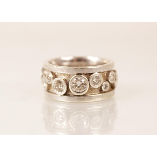 141 - A diamond 9ct gold ring, comprising sixteen round brilliant cut diamonds, with an estimated total di... 