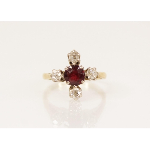 157 - A Victorian garnet and diamond ring, the central round mixed cut garnet measuring 5.3mm diameter, fl... 