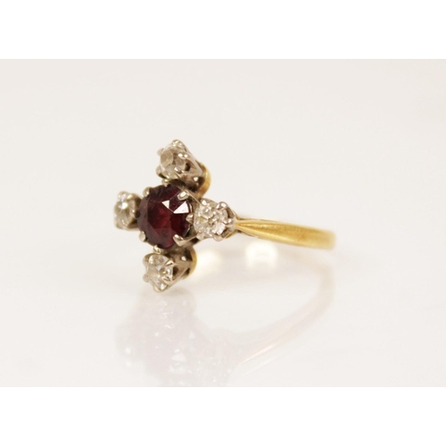 157 - A Victorian garnet and diamond ring, the central round mixed cut garnet measuring 5.3mm diameter, fl... 