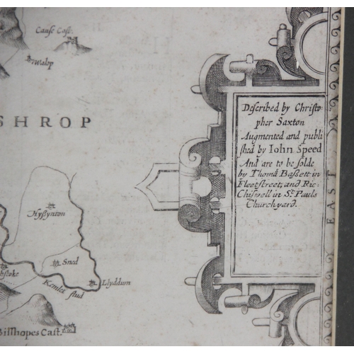 228 - After John Speed (1552-1629), MONTGOMERY SHIRE, an engraved uncoloured map on paper, strapwork title... 