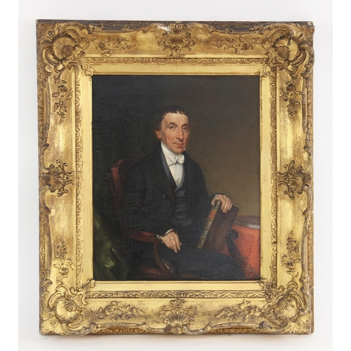 358 - English school (19th century),  
A half length portrait of a seated gentleman holding a book,  
Oil ... 