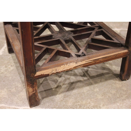 385 - A Chinese elm bedside table, 20th century, the cleated square top above a sliding tray, raised upon ... 