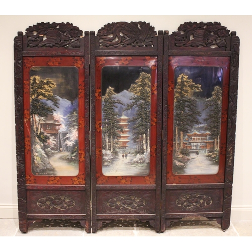 427 - A Japanese carved hardwood and lacquered three panel room screen, early 20th century, each section w... 