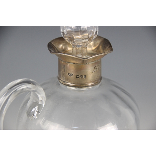 5 - A Victorian cut glass and silver mounted Whisky decanter, James Dudley, London 1895, of inverted bal... 