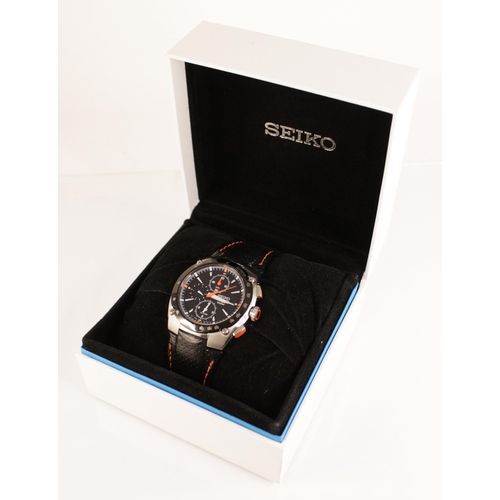 62 - A gentleman's Seiko Sportura Chronograph quartz wristwatch, the round black dial with luminous baton... 