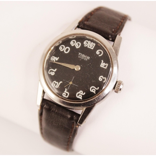 74 - A Tudor Oyster wristwatch, the circular black dial with Thai numerals and subsidiary seconds dial to... 