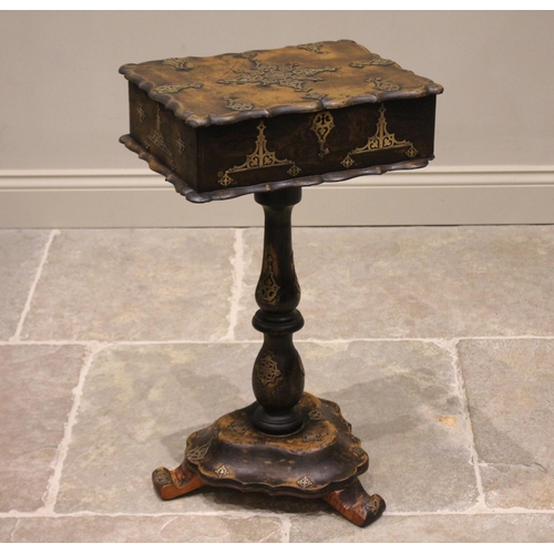 773 - A Victorian papier mache pedestal work box, the hinged top with a scalloped edge opening to a vacant... 