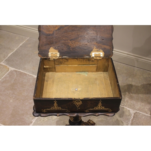 773 - A Victorian papier mache pedestal work box, the hinged top with a scalloped edge opening to a vacant... 