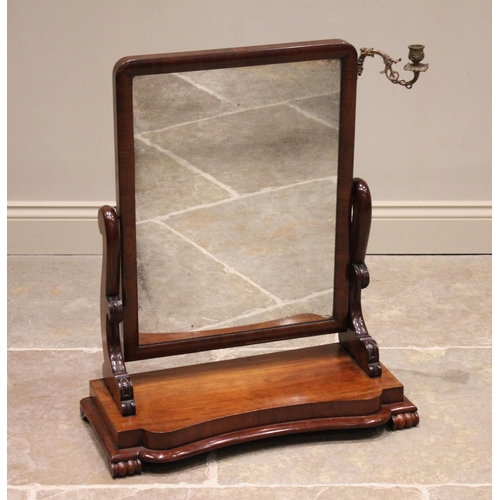 778 - A Victorian mahogany dressing table mirror, the plain moulded rectangular frame applied with a singl... 