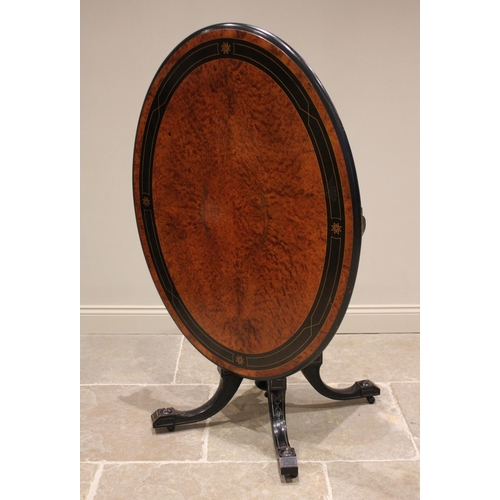 780 - A Victorian birds eye maple and ebonised Aesthetic Movement loo table, the quarter veneered oval til... 