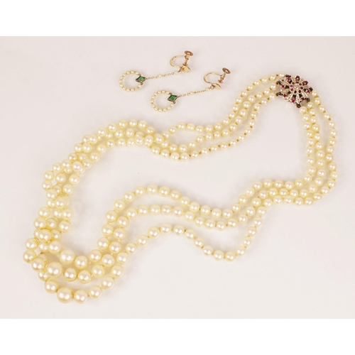 80 - A cultured pearl necklace, comprising three rows of graduated round cultured pearls measuring betwee... 