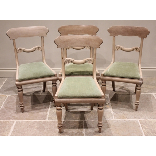 804 - A set of four mid 19th century painted dining chairs, possibly Scandinavian, each with a concave rai... 