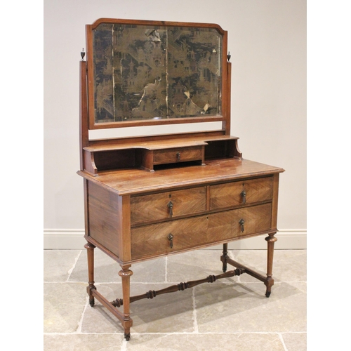 809 - A William and Mary style mahogany dressing table, early 20th century, the shaped rectangular mirror ... 