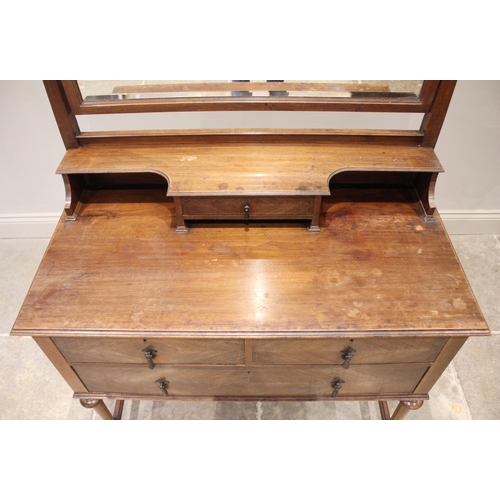 809 - A William and Mary style mahogany dressing table, early 20th century, the shaped rectangular mirror ... 