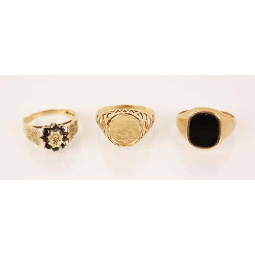 98 - A 9ct gold signet ring, the central black panel measuring 12mm x 10mm, set to a plain polished 9ct g... 