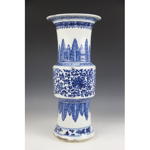 412 - A large Chinese porcelain blue and white Gu vase, 18th/19th century, decorated with formal scrolling... 