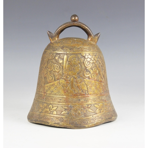 422 - A Chinese cast bronze temple bell, 20th century, decorated with panels depicting a warrior, within a... 