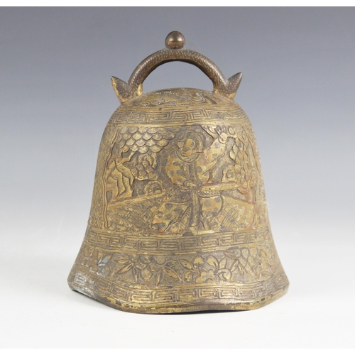 422 - A Chinese cast bronze temple bell, 20th century, decorated with panels depicting a warrior, within a... 