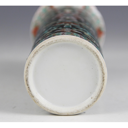 423 - A Chinese porcelain famille noir sleeve vase, 19th/20th century, of typical cylindrical form and dec... 