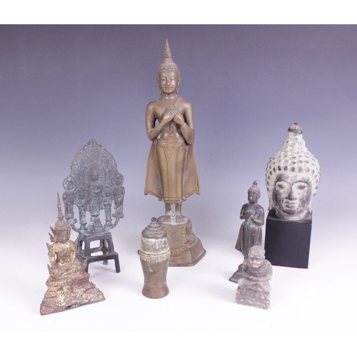 399 - A selection of South East Asian objet d'art, 20th century, to include a small bronze figure of conte... 